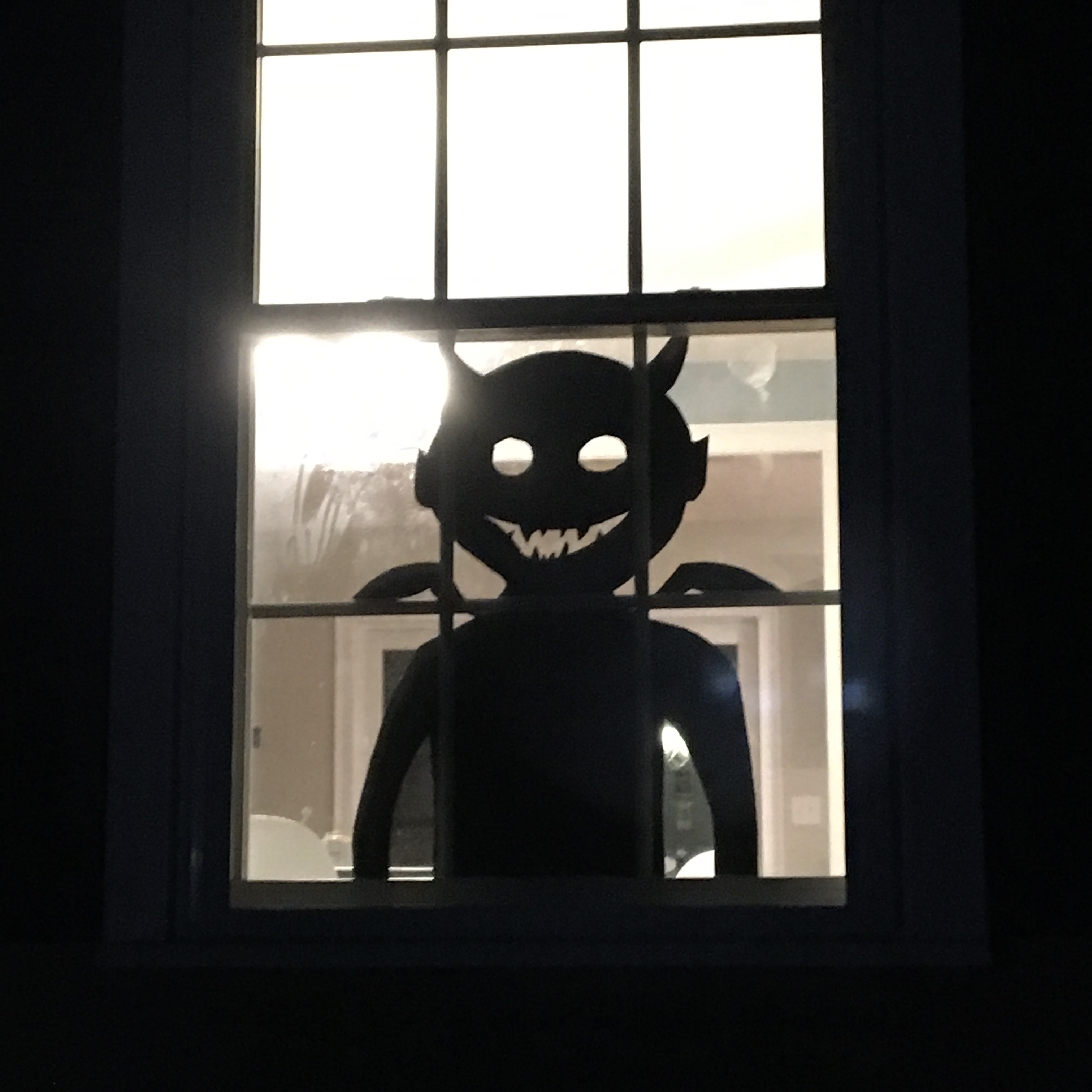 A creepy window decoration we made for Halloween.