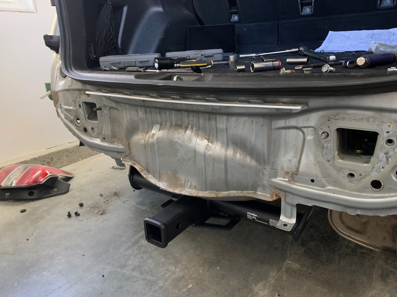 2014 Subaru Forester with the bumper removed for a hitch install.